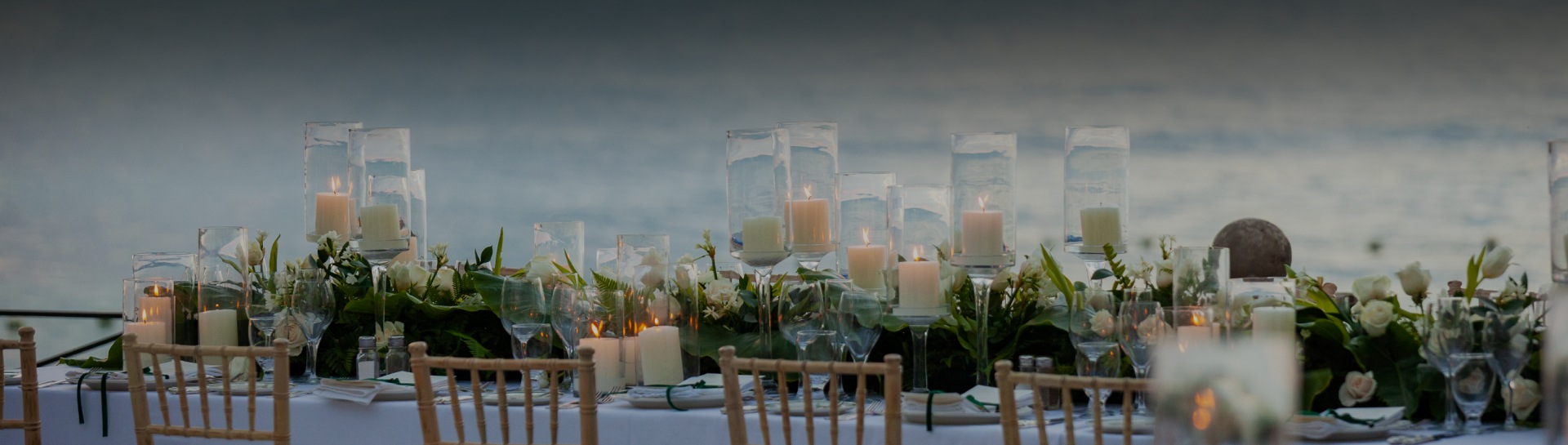 a table with candles and flowers
