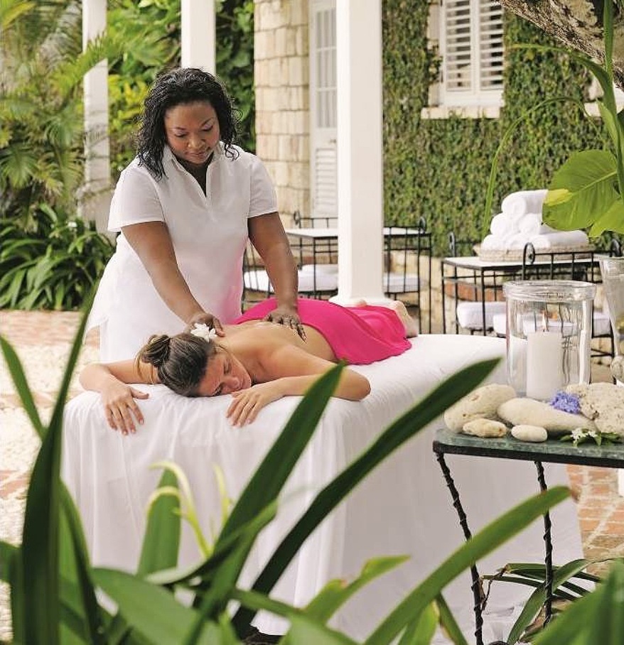 a woman receiving a back massage