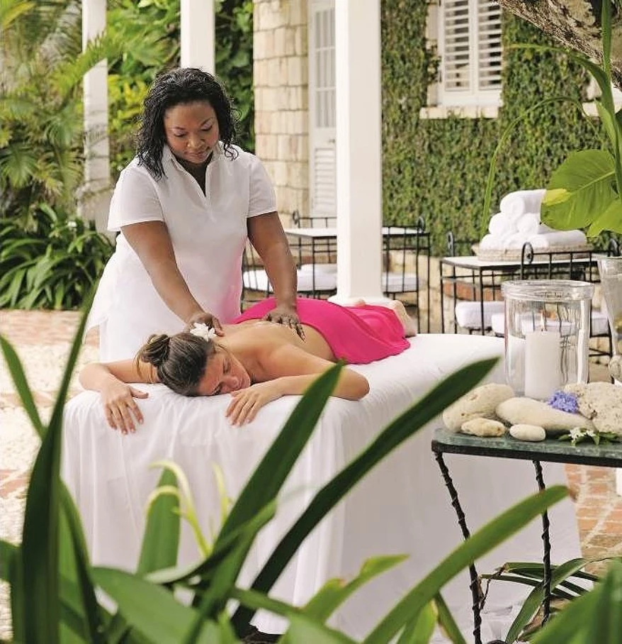 a woman receiving a back massage