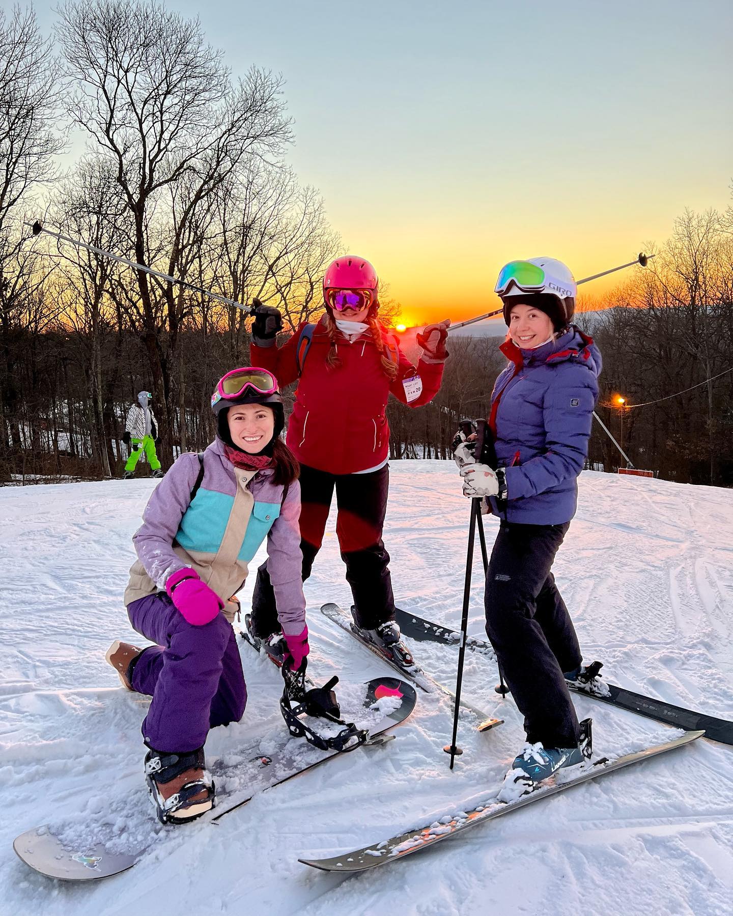 a group of people on skis posing for a picture