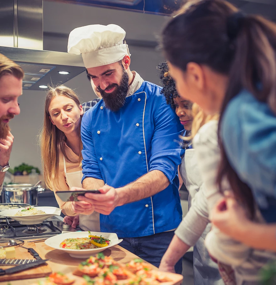 a group of people in a kitchen