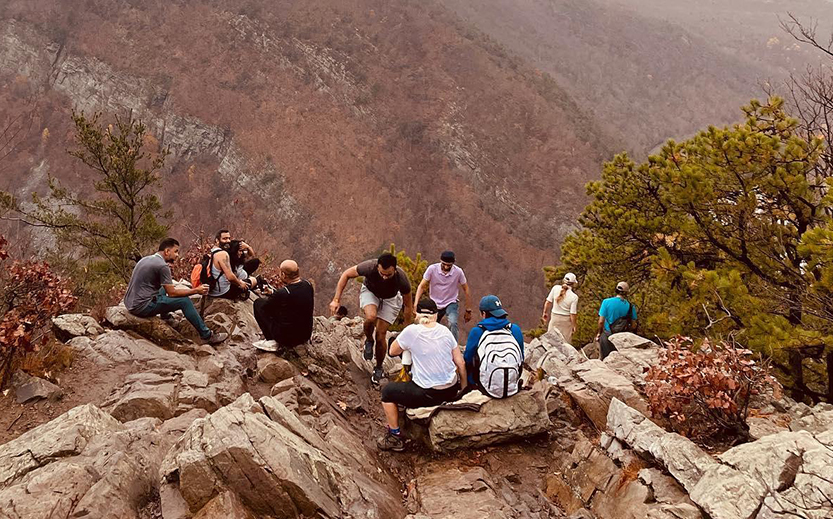 a group of people on a rocky mountain