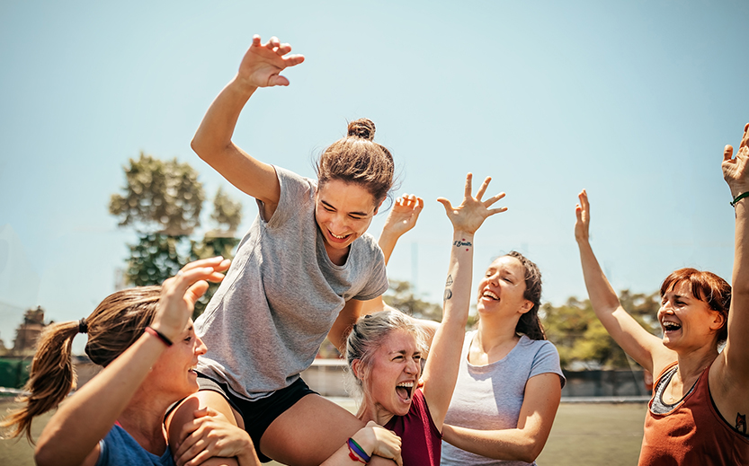 a group of women cheering