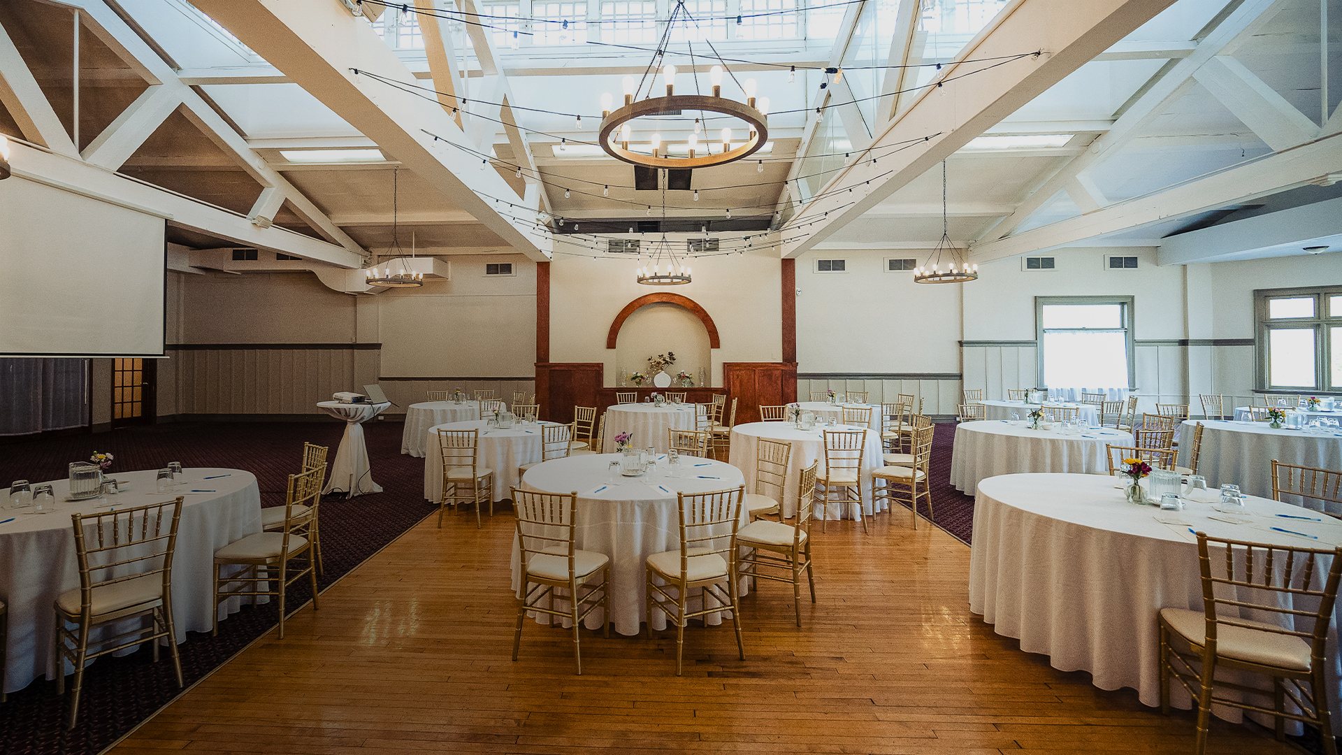 a room with tables and chairs