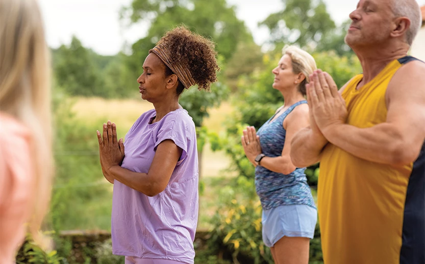 a group of people doing yoga