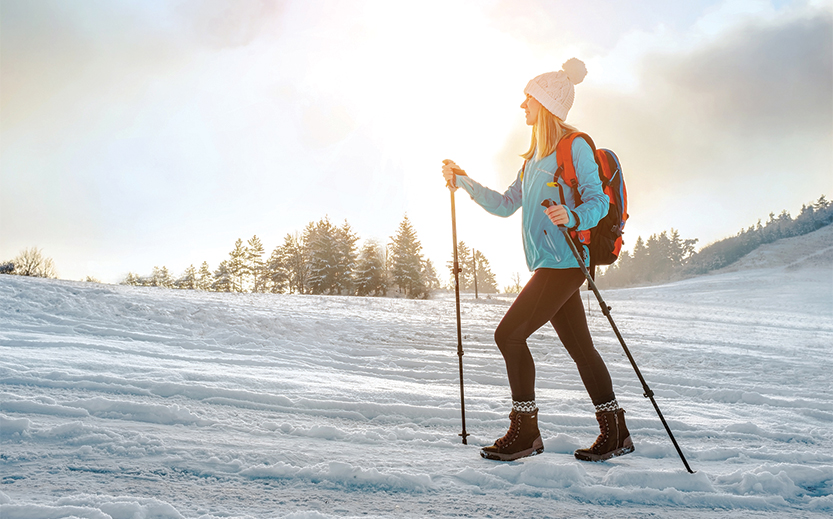 a woman walking in the snow