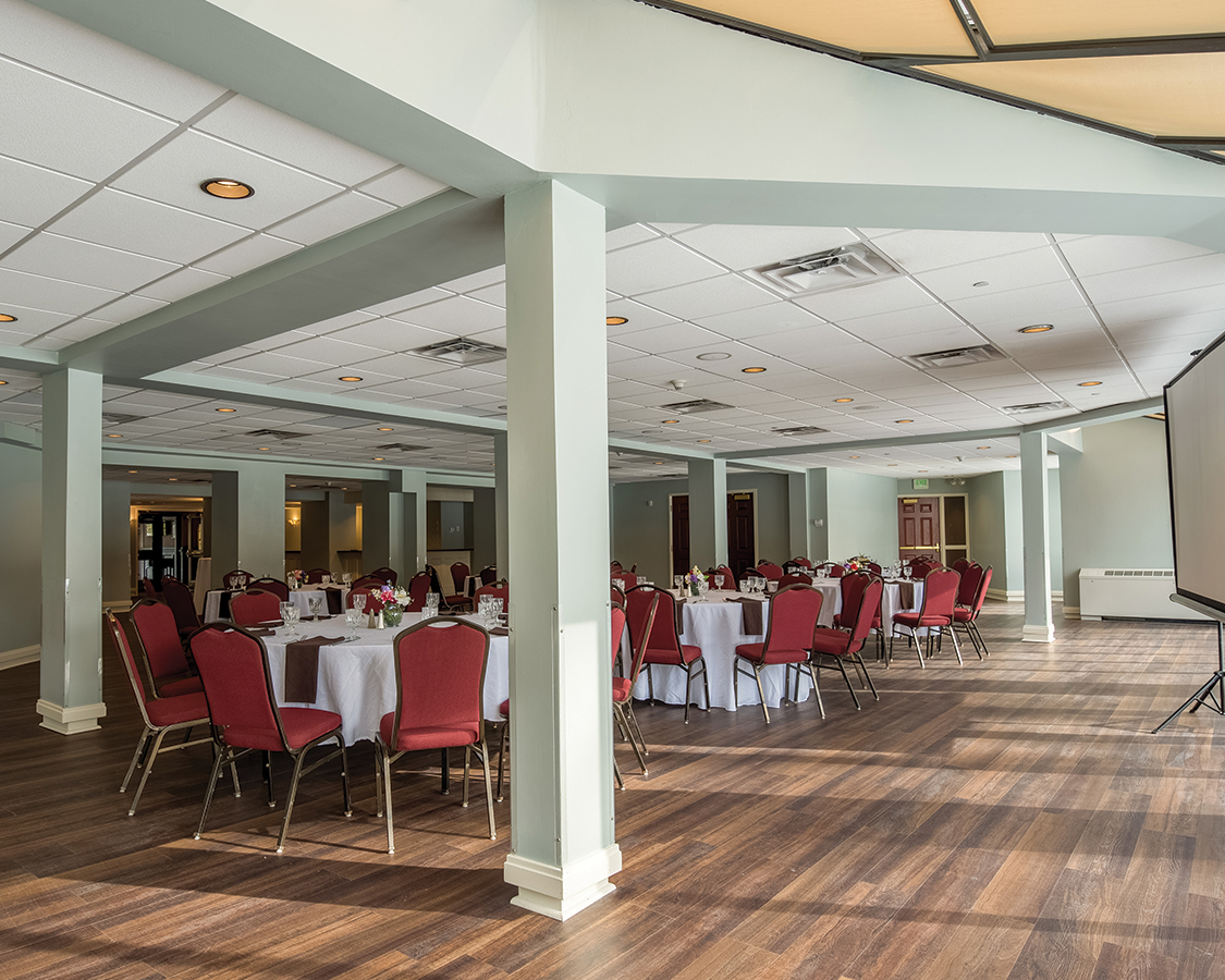 a room with tables and chairs