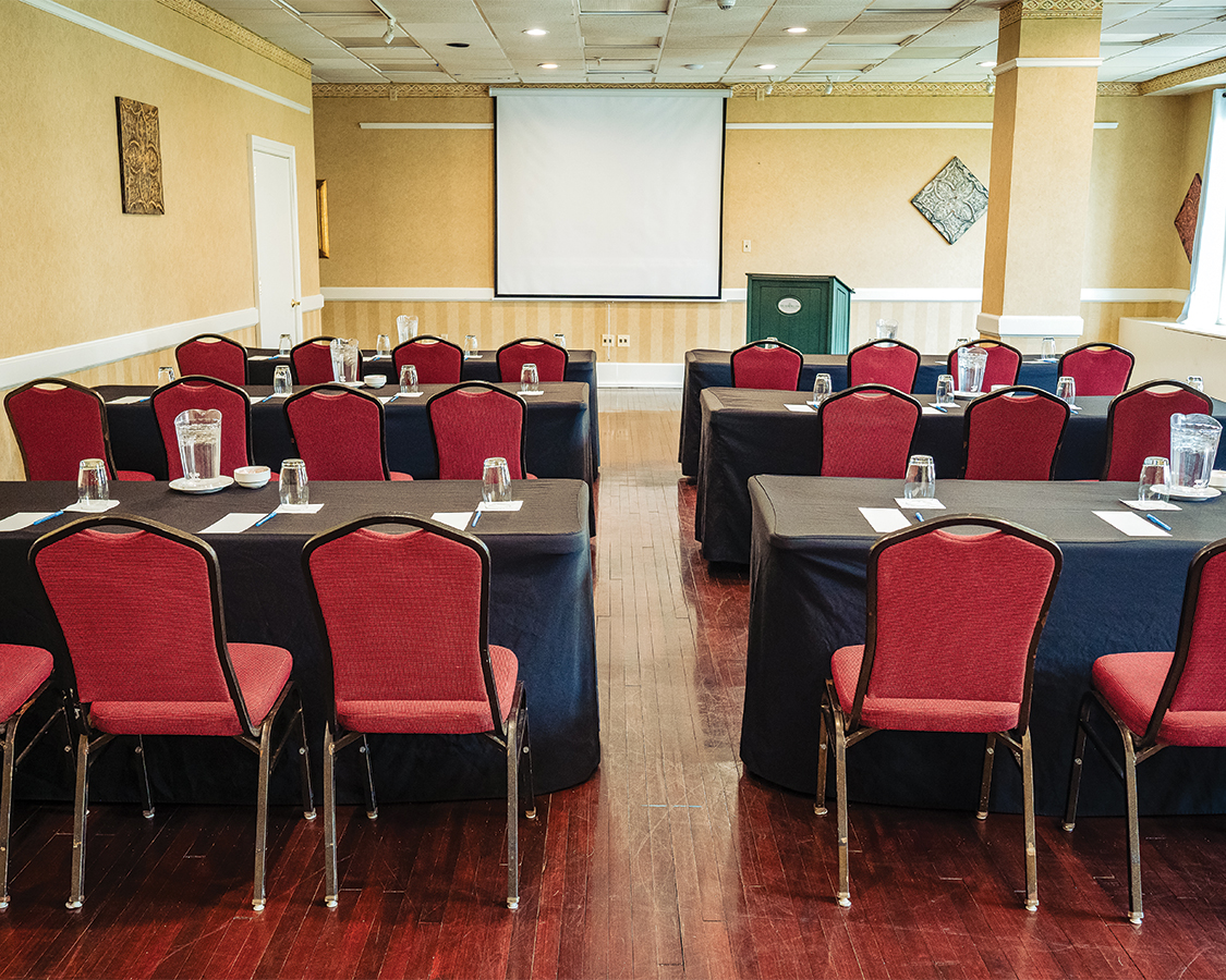 a room with tables and chairs