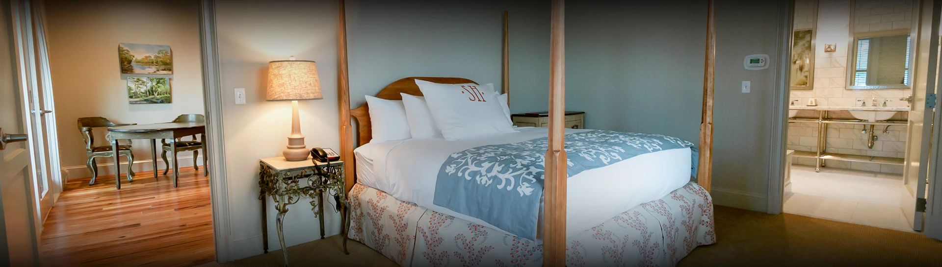 a bed with four poster posts