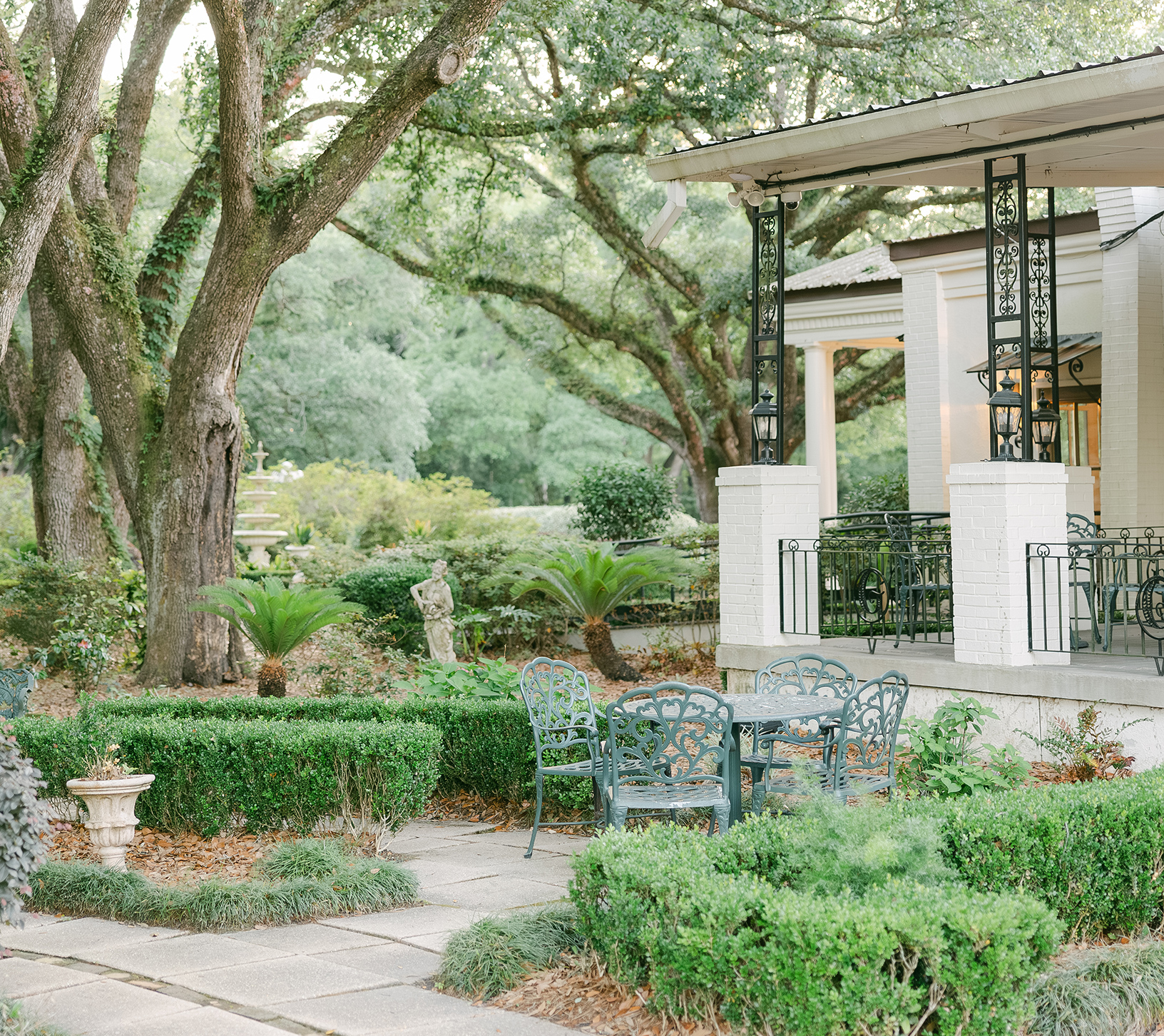 a house with a patio and trees