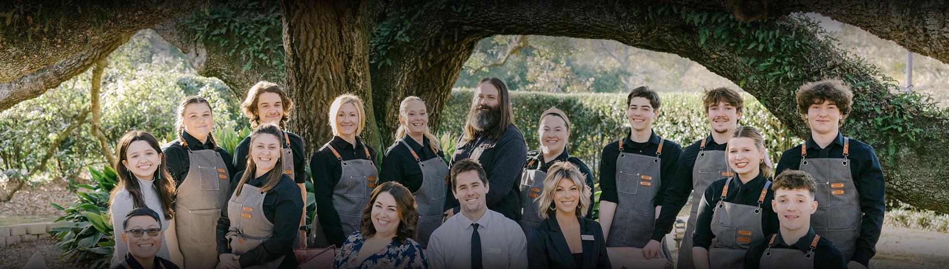 a group of people posing for a photo