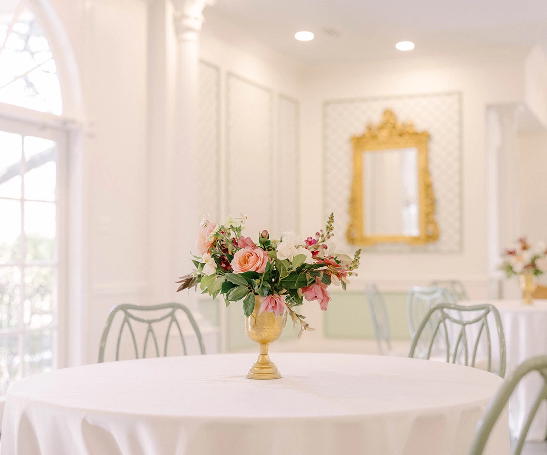 a vase of flowers on a table