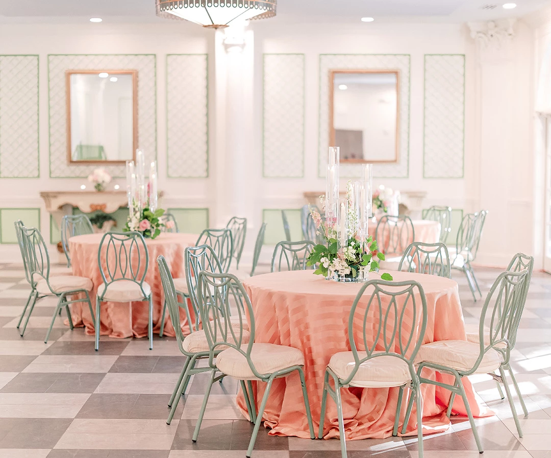 a room with tables and chairs