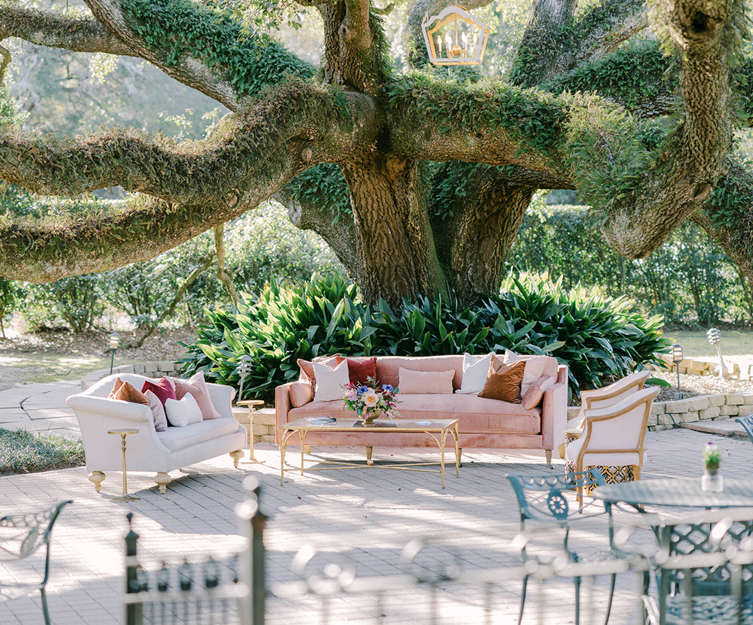 a outdoor patio with furniture and table
