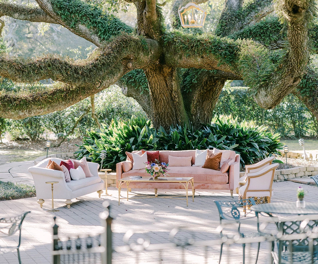 a outdoor patio with furniture and table