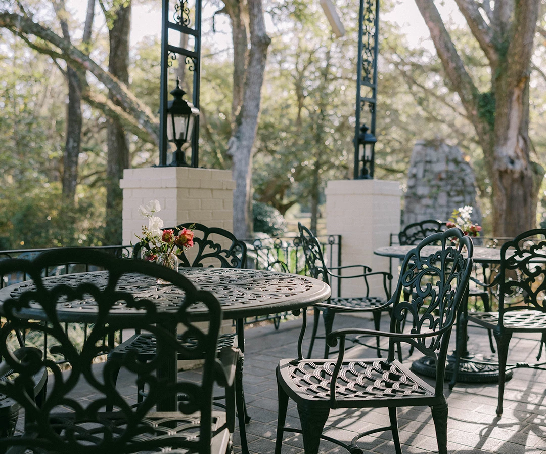 a table and chairs on a patio