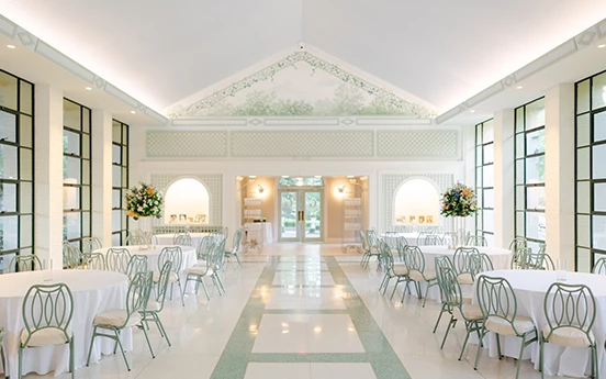 a room with tables and chairs