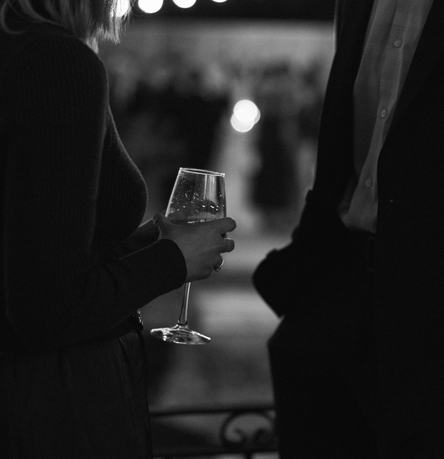 a woman holding a wine glass