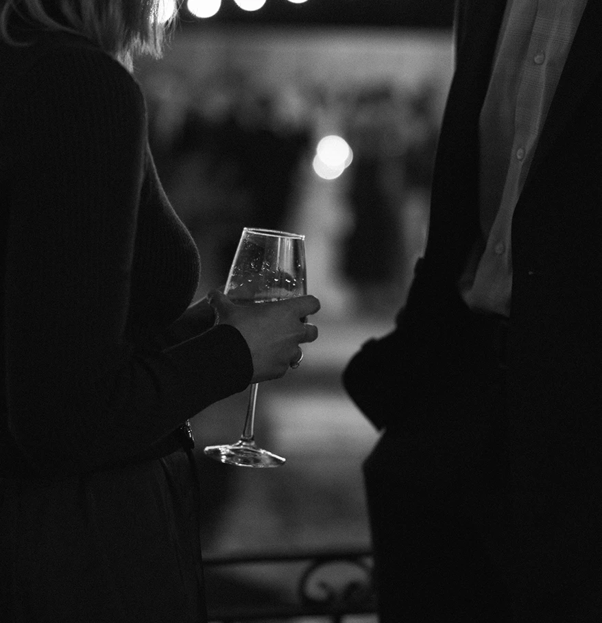a woman holding a wine glass