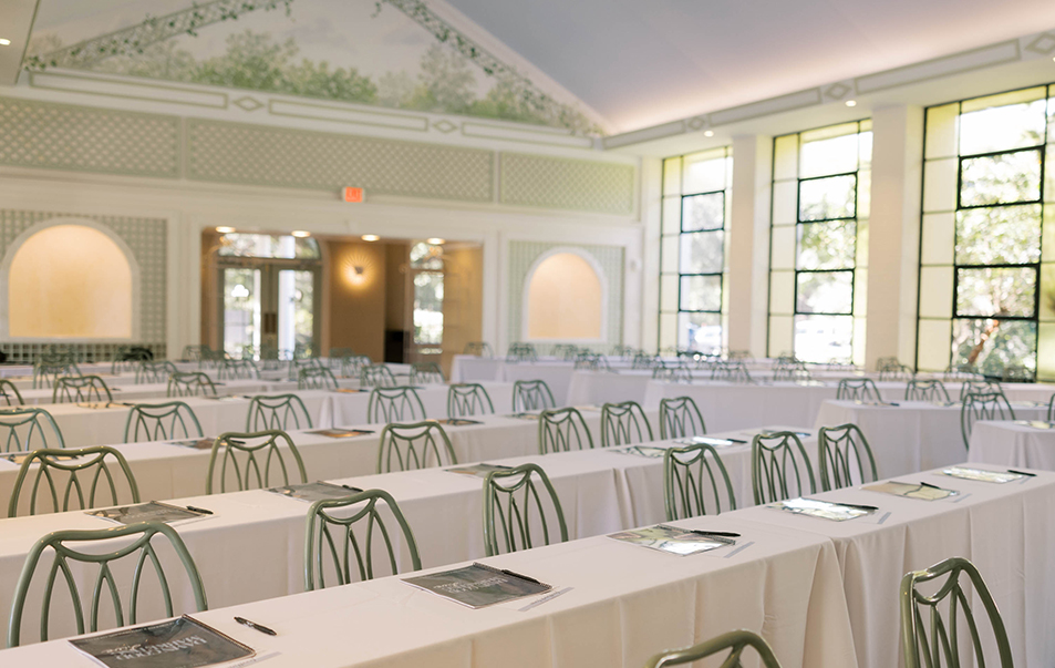 a room with tables and chairs