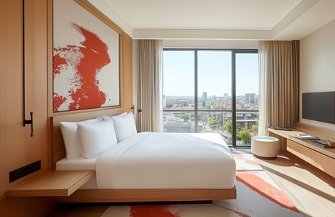a bedroom with a large window