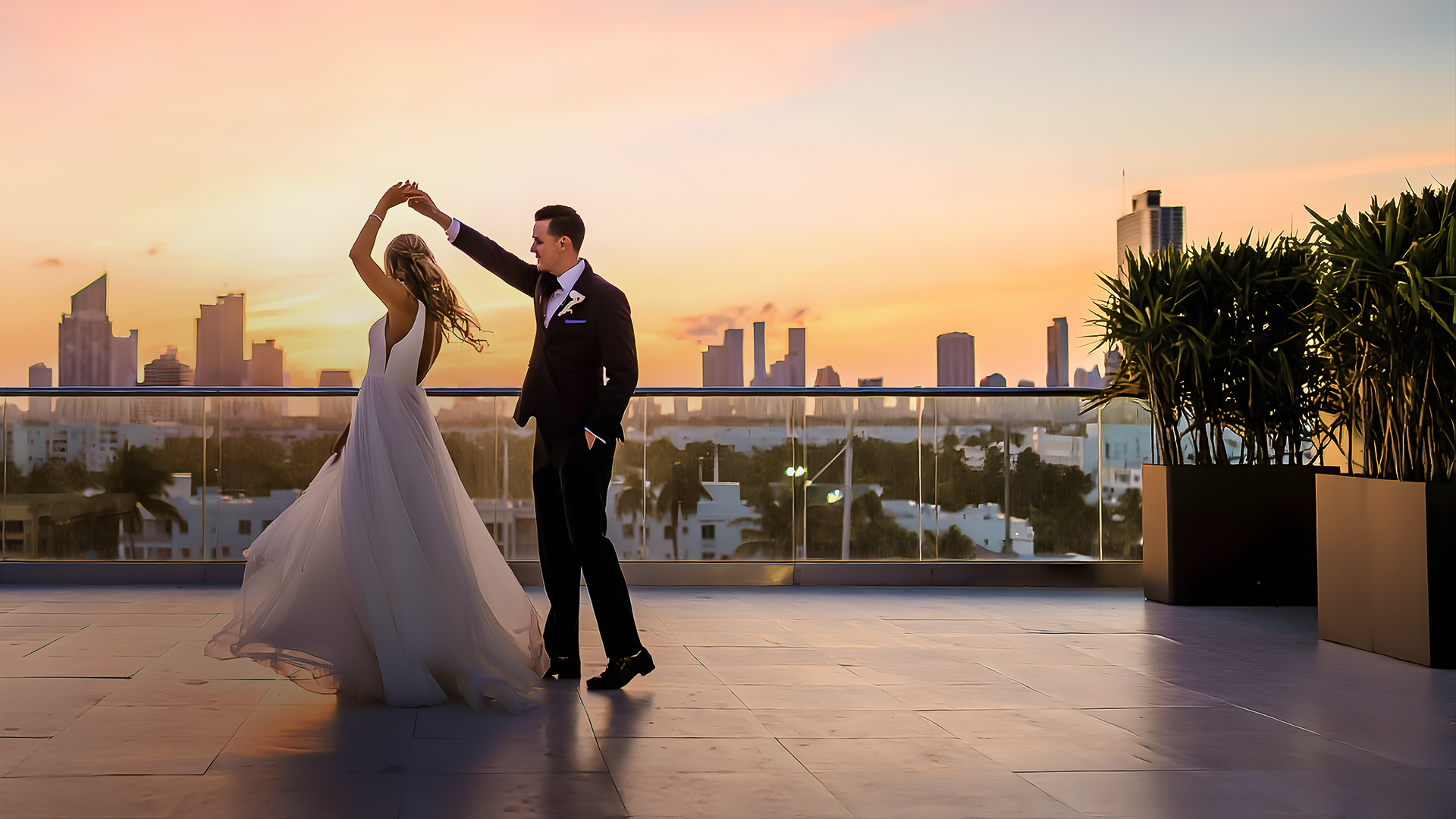 a man and woman dancing on a rooftop