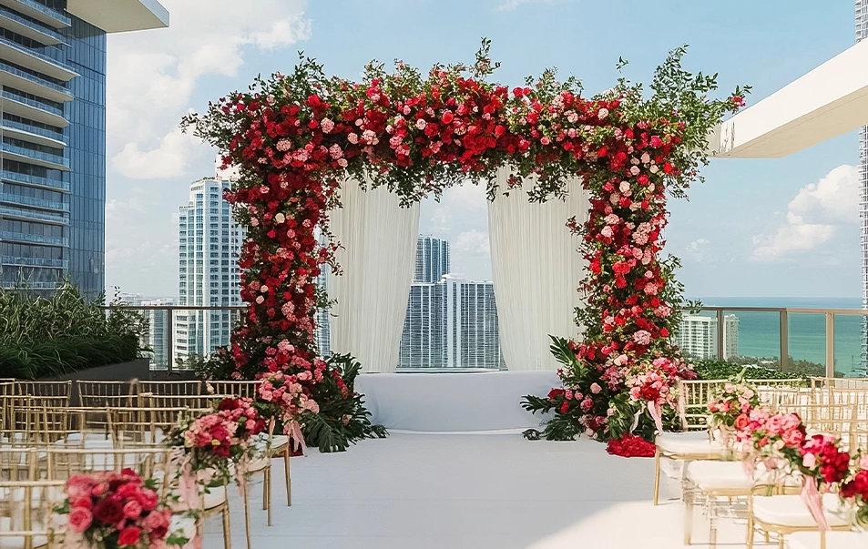 a wedding ceremony with flowers and chairs