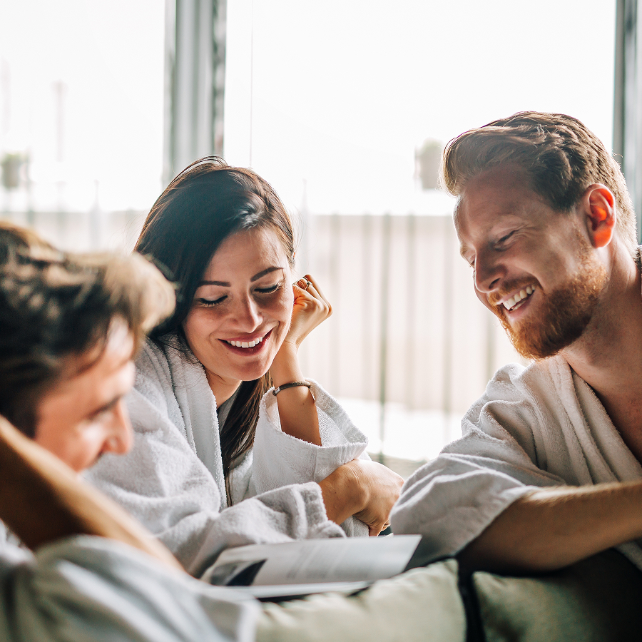 a group of people in bathrobes