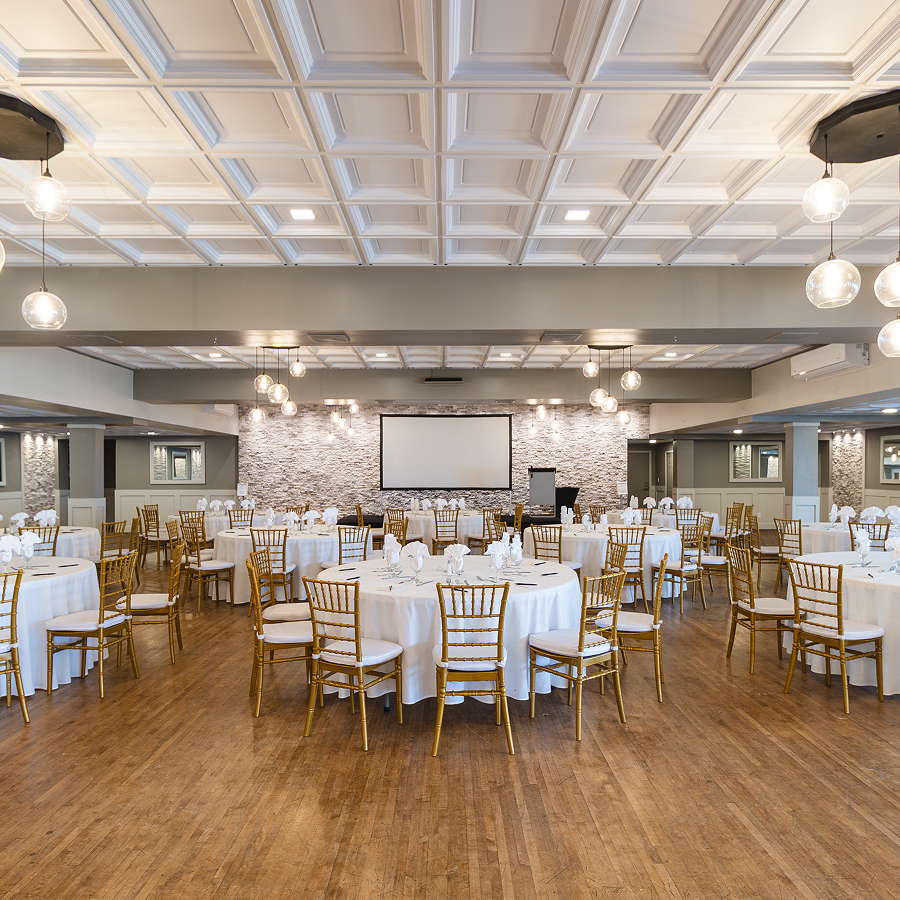 a room with tables and chairs