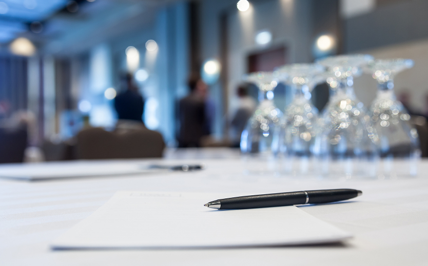 a pen on a paper on a table