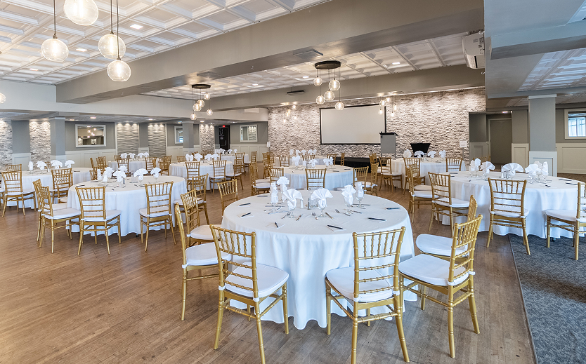 a room with tables and chairs