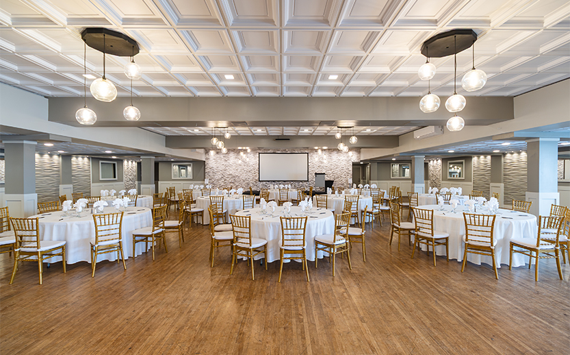 a room with tables and chairs