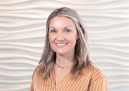 a woman smiling at camera