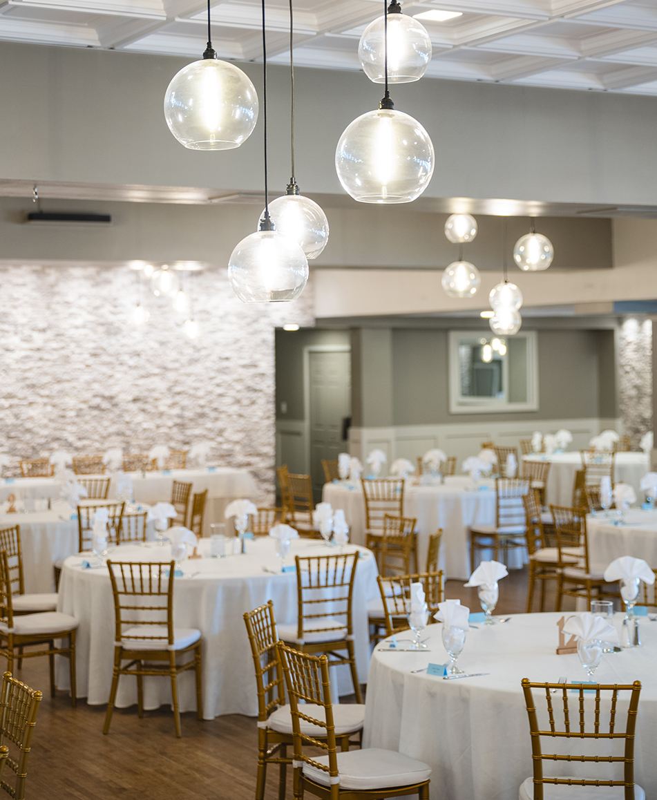 a room with tables and chairs