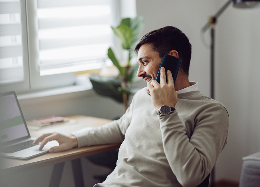 a man talking on a cell phone