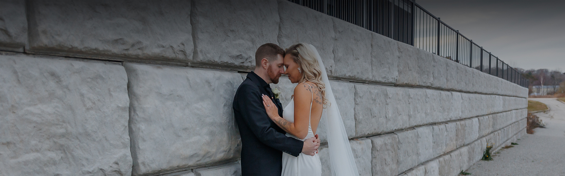 a man and woman in wedding attire