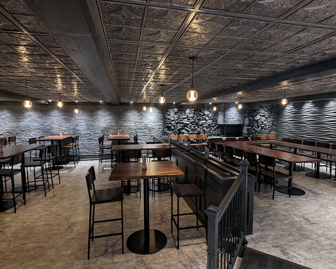 a room with tables and chairs
