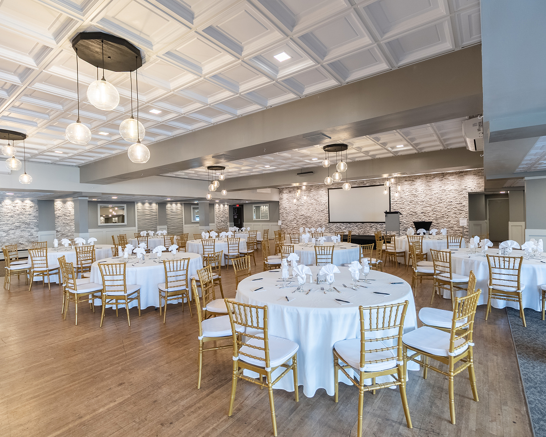 a room with tables and chairs