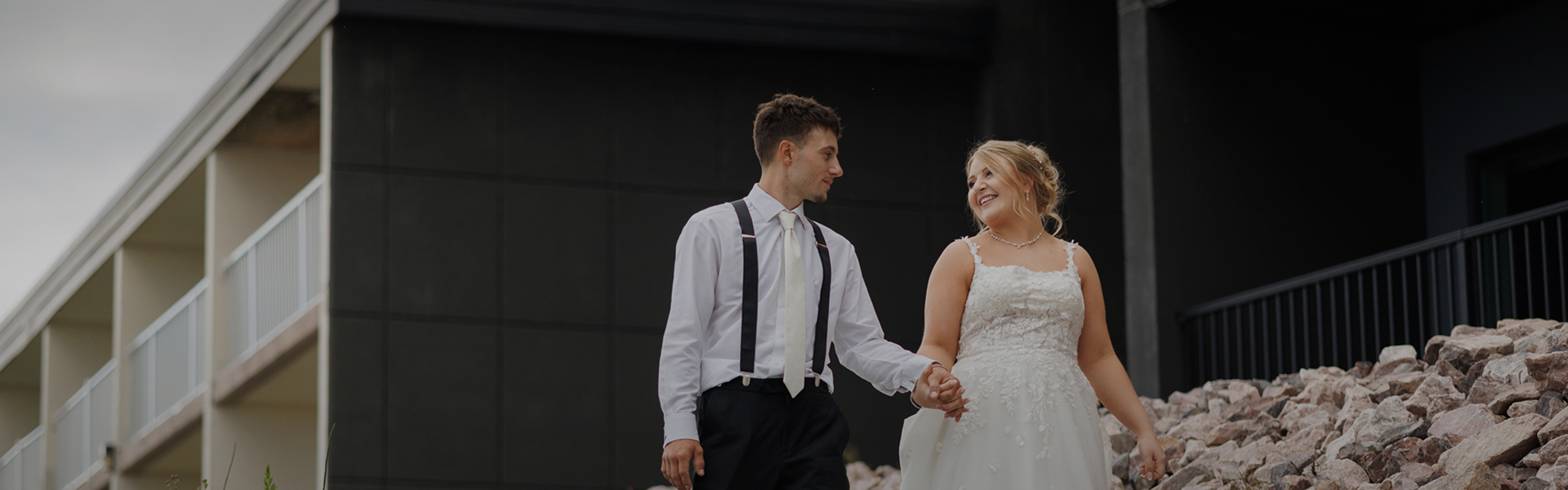 a man and woman holding hands