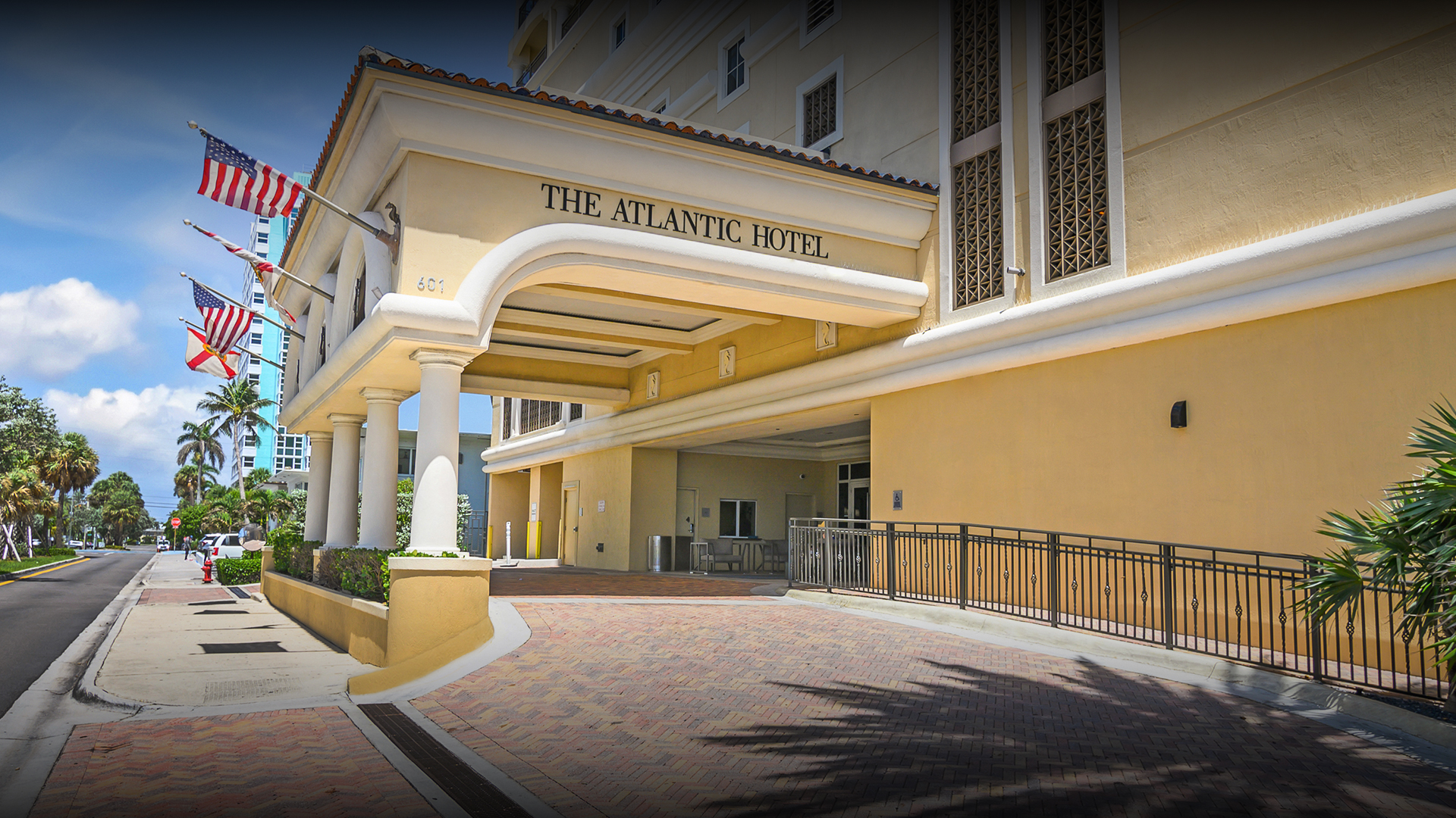a building with columns and a gate