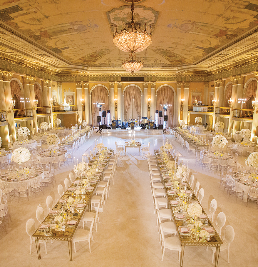 a large ballroom with tables and chairs