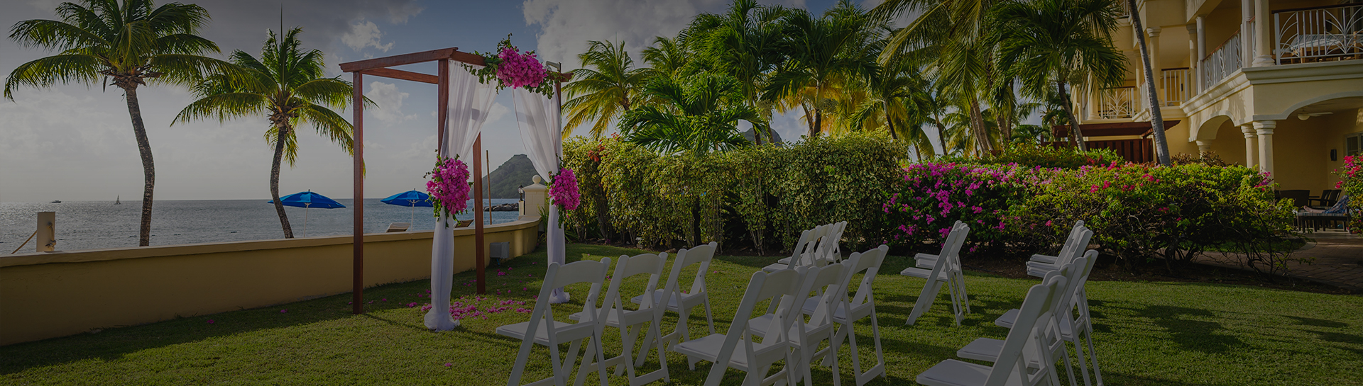 a wedding ceremony set up in a garden