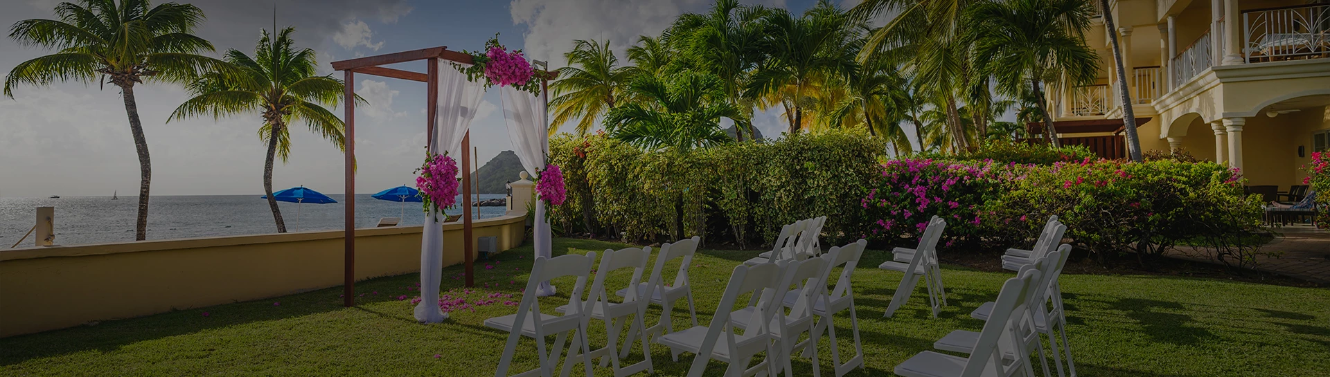 a wedding ceremony set up in a garden
