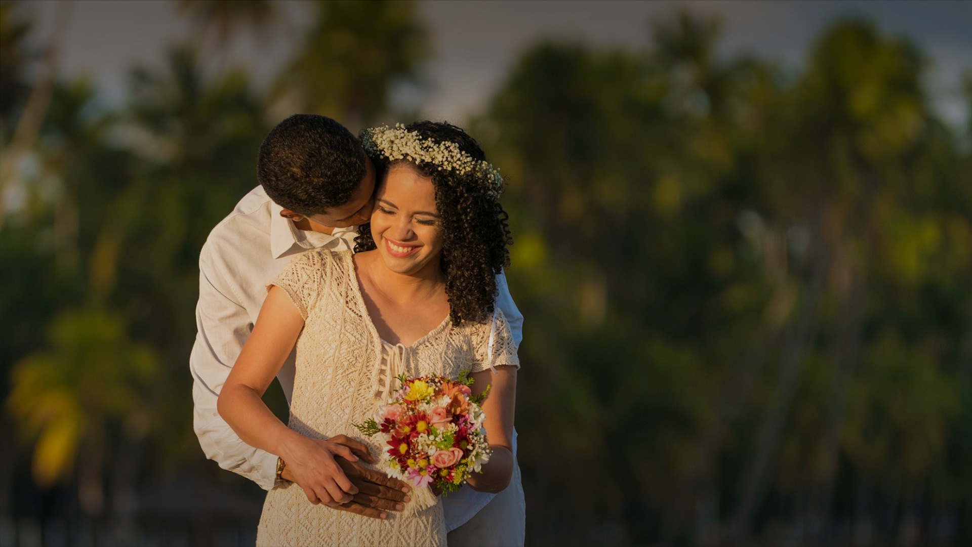 a man and woman kissing