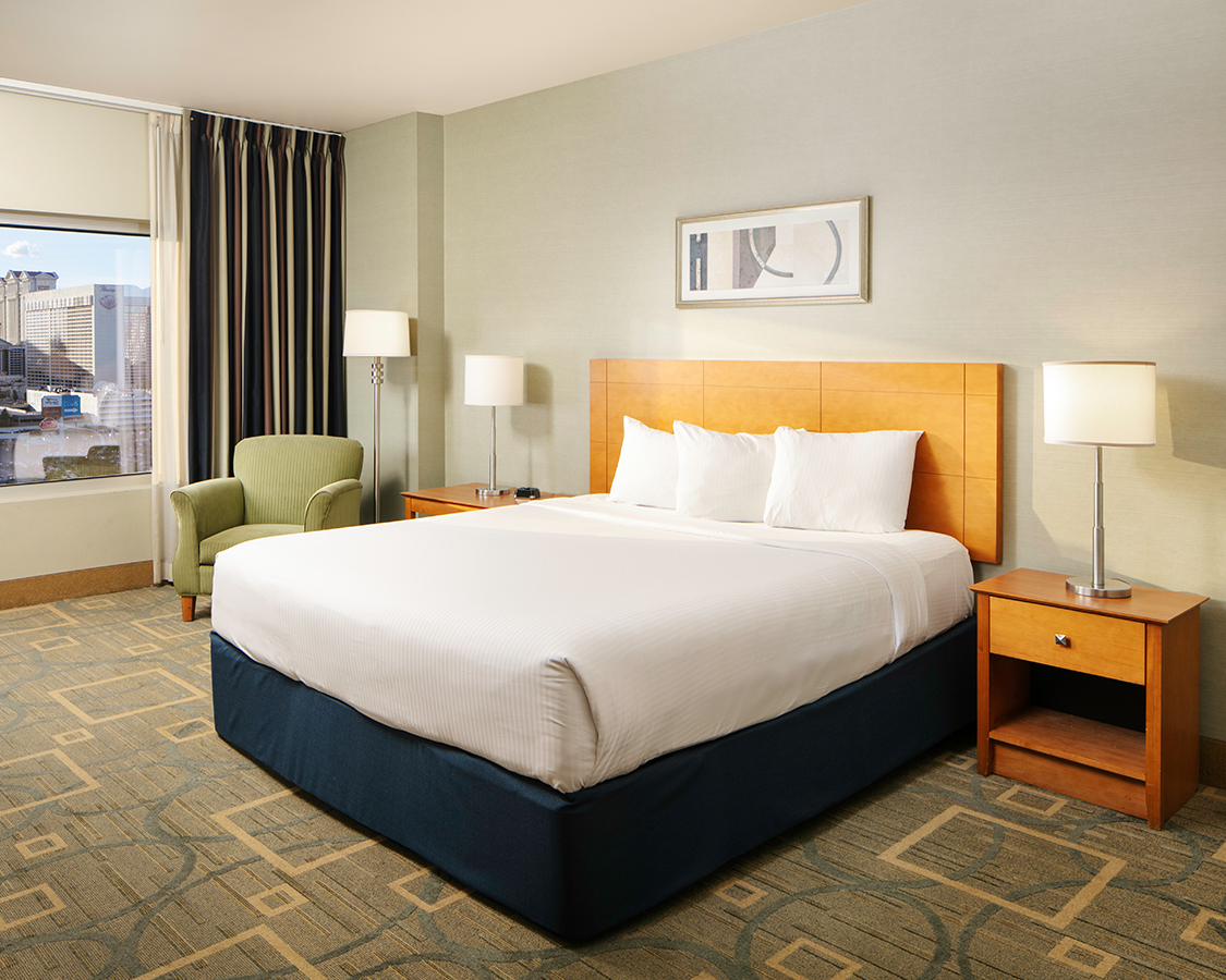 a bed in a hotel room