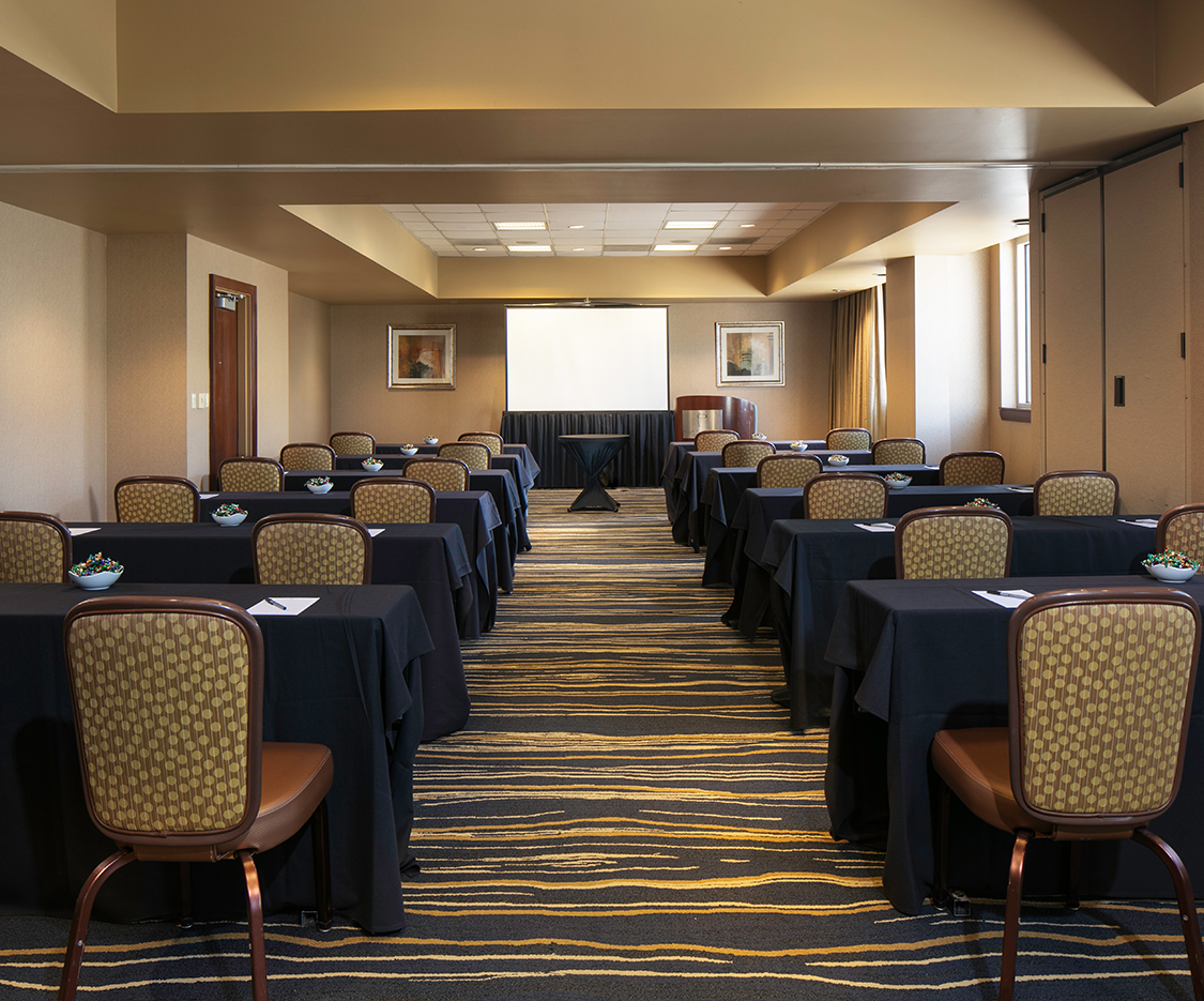 a room with tables and chairs