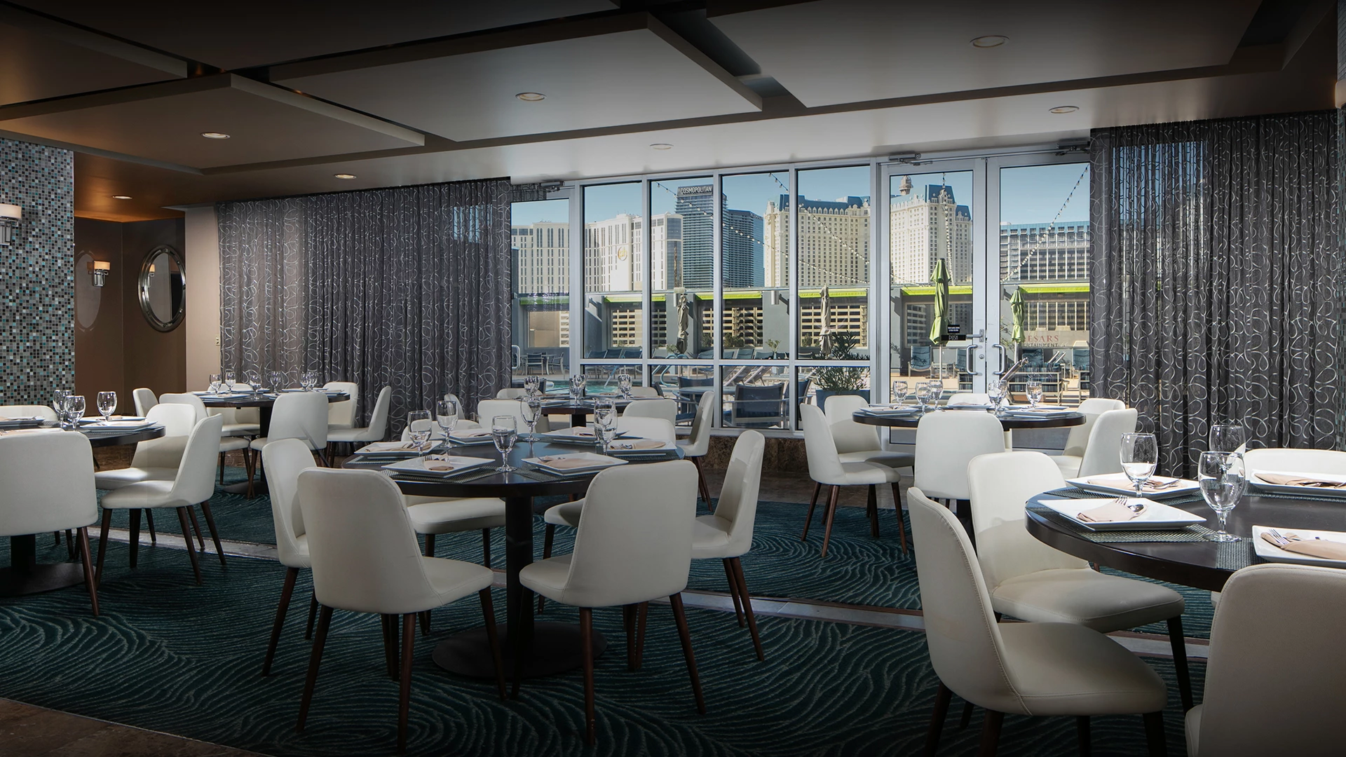 a room with tables and chairs