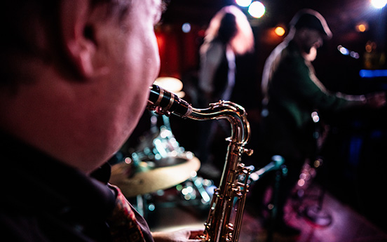 a man playing a saxophone