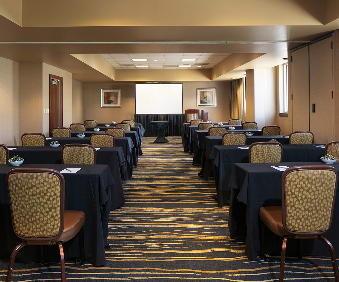 a room with tables and chairs