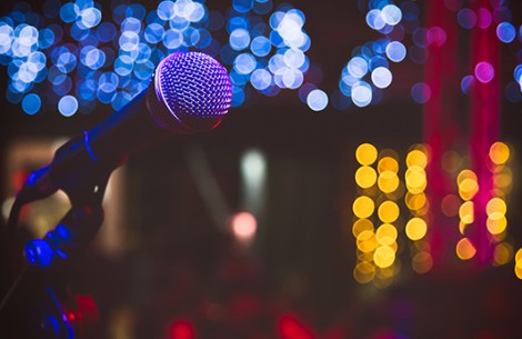 a microphone in front of a blurry background